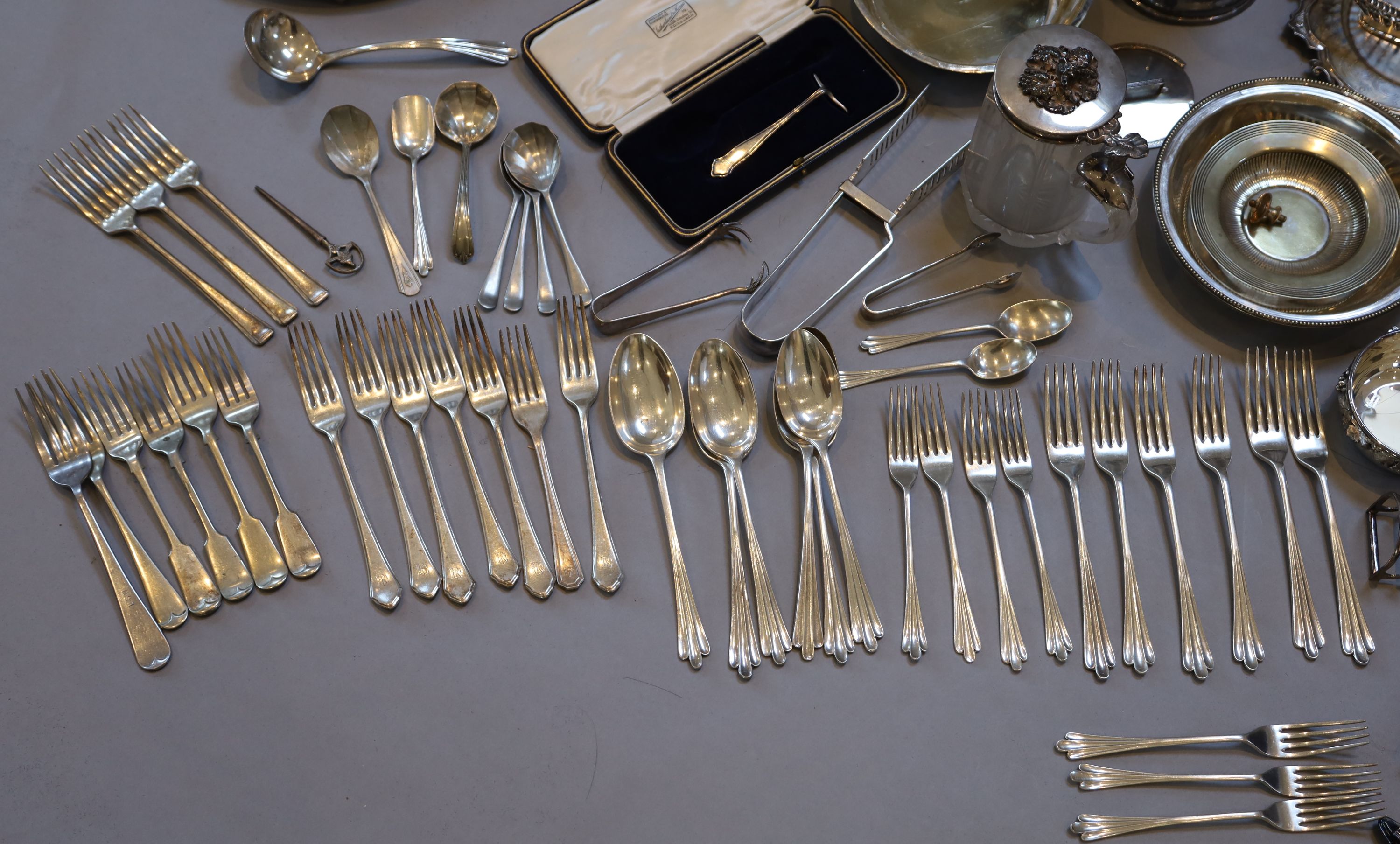 A collection of assorted plated wares,